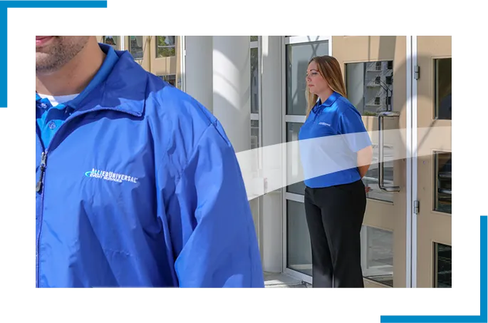 two people  in allied universal blue uniform working as event security staffing