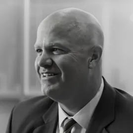 greyscale photo of justin kelley